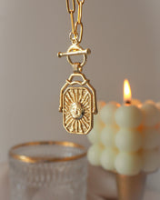 Load image into Gallery viewer, Celestial Flow - Gold Titanium Steel Moon &amp; Sun Toggle Necklcae
